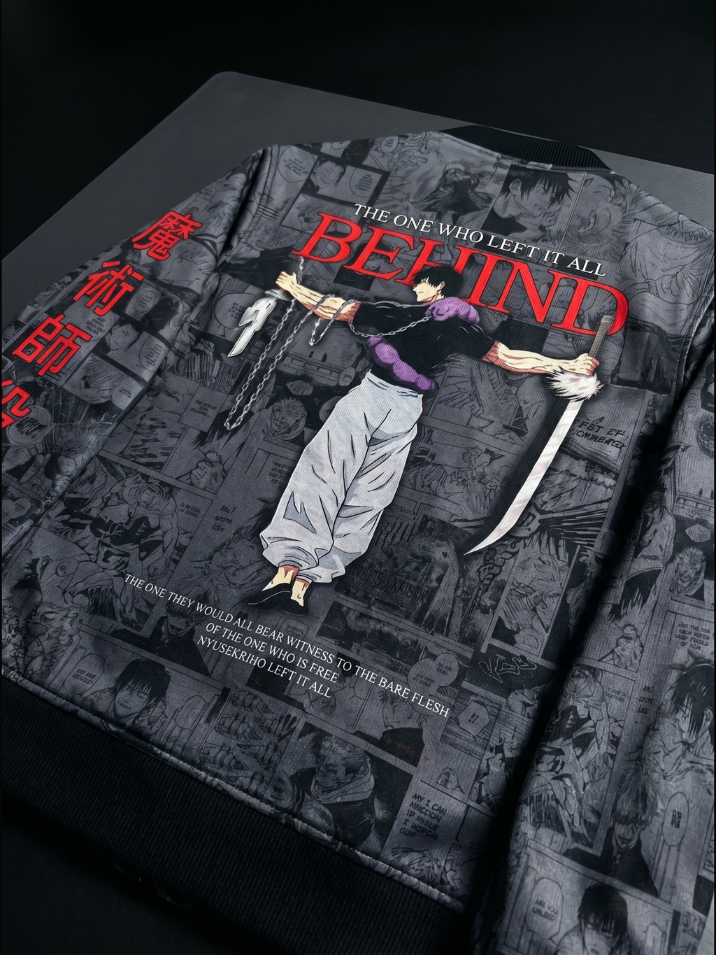 Fushiguro jacket of 'The One Who Left It All Behind' with an illustration of a person bound by chains against a dark background.