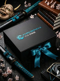 Black box with 'Kuro Republic' logo surrounded by samurai swords and cherry blossoms on a dark surface